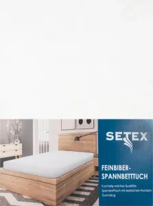 Простыня на резинке Setex из тонкой фланели, размер 140-160 х 200 см, белая. Тонкая фланелевая отделка для дополнительного тепла в холодные дни. Traumschloss