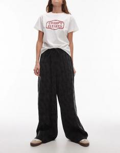 Брюки с жаккардовым цветочным узором и завязками черного цвета Topshop