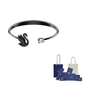 Браслет с открытой застежкой с лебединым мотивом Swarovski