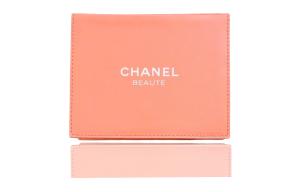 CHANEL Оранжевая кожаная косметичка Single Layer