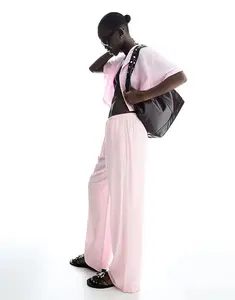 Брюки Bershka из льняной смеси с эластичным поясом розового цвета