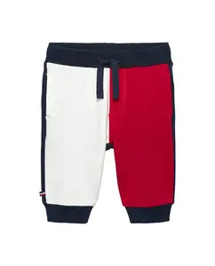 Спортивные детские брюки в стиле колор-блок корпоративного цвета Tommy Hilfiger