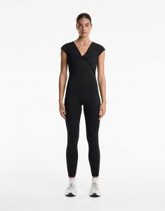 Длинный комбинезон Oysho Comfortlux с открытой спиной черного цвета