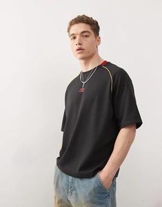 Футболка Umbro с сетчатыми вставками черного цвета