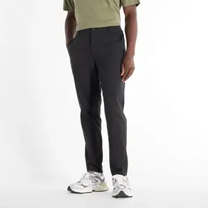 Брюки New Balance Athletics Standard Tapered 30В'', черный