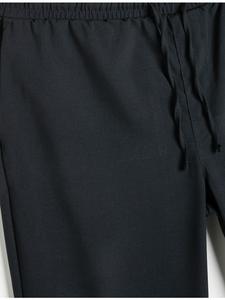 Брюки темно-синего цвета KOTON