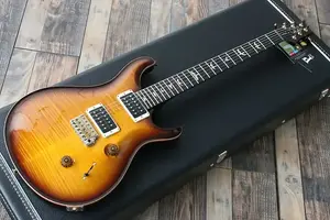 Электрогитара PRS Custom 24 с 10-полосной верхней шпоновой крышкой цвета янтарного градиента, изготовленная в США, с двумя звукоснимателями и двойным тремоло