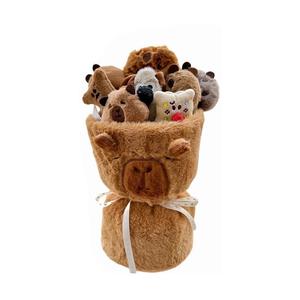 Плюшевая игрушка капибара с букетом, высота 30 см A little tide to play