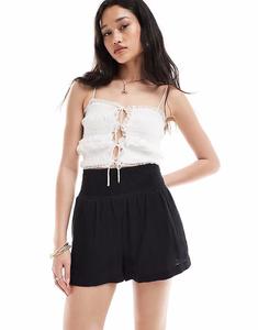 Шорты из фактурного хлопка ASOS DESIGN черного цвета с эластичным поясом