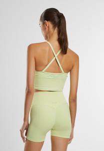 Легкая поддержка спортивного бюстгальтера SEAMLESS CROSS BACK BRALETTE aim’n®, зеленый