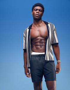 Плавки-шорты ASOS DESIGN средней длины с карманами-карго черного цвета