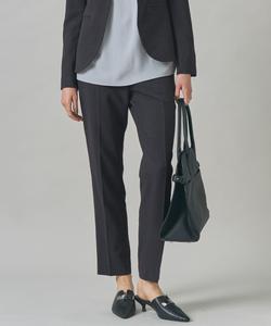 Шерстяные эластичные брюки из липкой ткани, растягивающиеся в двух направлениях.