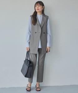 Жилет без воротника из ткани свободного плетения