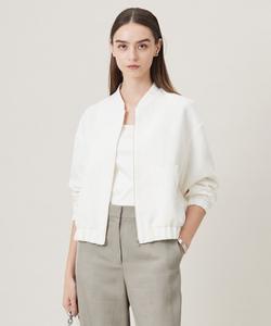 Блузон из светлого твида, пригодный для стирки.