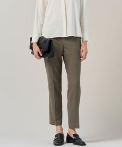 Шерстяные эластичные брюки из липкой ткани, растягивающиеся в двух направлениях.