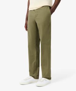 Брюки-чиносы прямого кроя, зауженные книзу, из эластичной ткани.