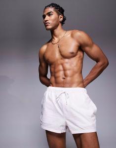 Плавки-шорты из сирсакера ASOS DESIGN очень короткой длины розового цвета