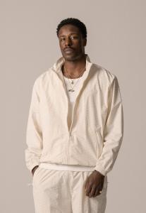 Тренировочная куртка ALLOVER TRACK JACKET UNISEX BLKVIS, кремовый