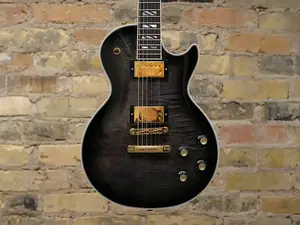 Gibson Les Paul Supreme 2023 - настоящее время - Прозрачный Эбеновый Взрыв 7 фунтов 12,4 унции