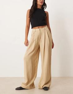 Брюки Mango со складками спереди бежевого цвета
