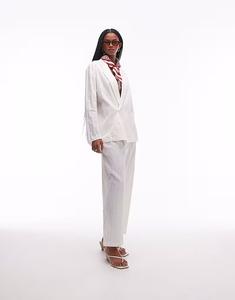 Комбинируемые брюки из льна плиссе белого цвета Mango