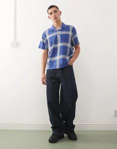 COLLUSION — облегающее поло свободного кроя в синюю клетку