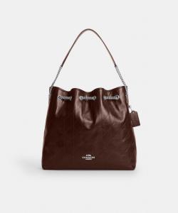 Большая стеганая сумка через плечо Evelyn