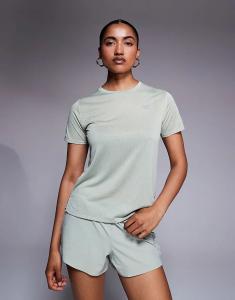 Футболка New Balance Athletics светло-зеленого цвета