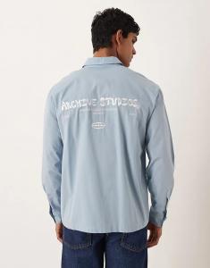 Свободная рубашка ASOS DESIGN синего цвета с вышивкой на груди и спине