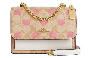 Кожаная цепная сумка через плечо миниатюрная женская Klare Canvas от COACH в светло-бежевом и мелово-белом цветах