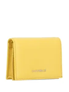 Кошелек из шагреневой кожи Coccinelle, желтый