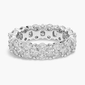 Кольцо Eternity с чередующимися круглыми и овальными камнями из белого золота 14 карат (3 карата). Blue Nile