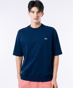 Толстовка с короткими рукавами свободного кроя из органического хлопка на махровой подкладке.