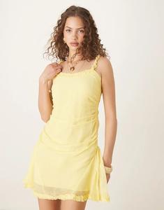 Мини-платье ASOS DESIGN с оборками и пышной юбкой желтого цвета