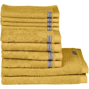 Набор полотенец Sinfonie включает в себя полотенца для гостей, полотенца для рук и банные полотенца Ross, горчичный