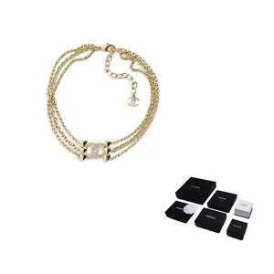 CHANEL Двойная металлическая цепочка C для женщин gold