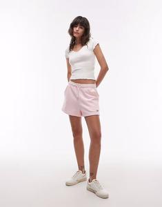 Трикотажные шорты Tommy Jeans с логотипом в нежно-розовом цвете