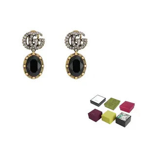 Кристаллами украшенные серьги Double G GUCCI