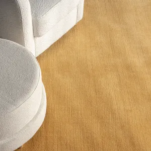 Ковер Arrel из смеси шерсти с пятнистым рисунком nuLOOM, 91x152 см, золотой