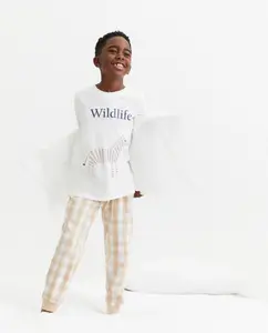 Длинная пижама для мальчика с футболкой и штанами в принте Cotton Juice, коричневый