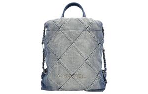 CHANEL Сумка рюкзак из джинсовой ткани голубого цвета с серебристой металлической фурнитурой