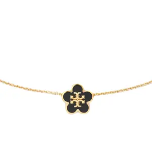 Кулон с цветком Киры TORY BURCH, золотой