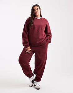 Спортивные брюки Curve Ultimate с манжетами и защипом ворса в бордовом цвете Asos Curve