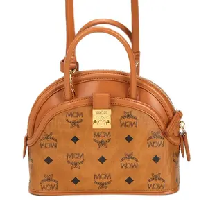 MCM Кожаная сумка через плечо с кожаными вставками