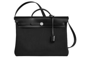 Сумка-мессенджер Herbag из холста с кожей коровы Hunter черная HERMES