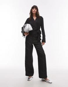 Брюки с низкой посадкой из фактурного жаккарда черного цвета Topshop