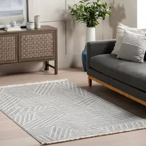 Ковер Esmeray Modern Geometric Tasseled Area Rug nuLOOM, 152x244 см, светло-голубой