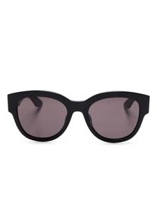 Alexander McQueen Eyewear солнцезащитные очки в круглой оправе, черный