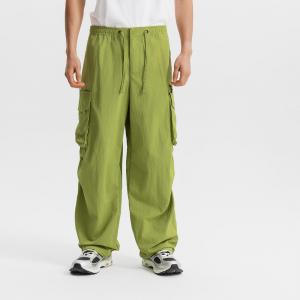 Унисекс спортивные брюки Decathlon SPORTSWEAR городские функциональные с несколькими карманами в оливковом цвете