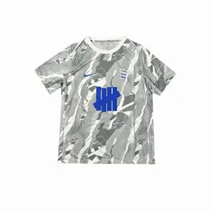 X UNDEFEATED X BCFC футболка унисекс Nike, серый